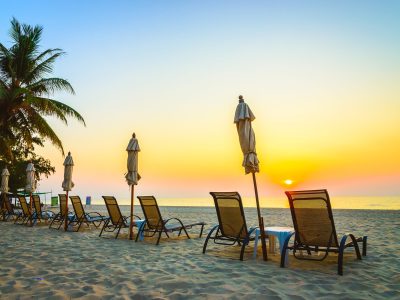 Beach chair with sunrise on twilight time - vintage filter